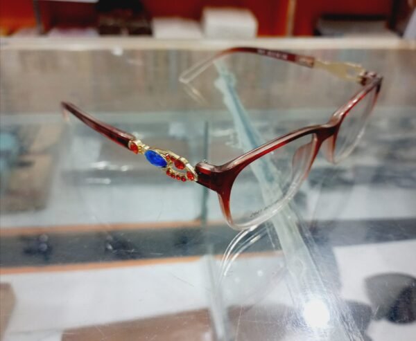 Gold Star Red Crystal Eyeglasses with Decorative Temple Design